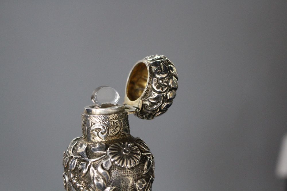 A Late Victorian silver mounted perfume bottle, in Goldsmith & Silversmith box, by Horton and Allday, Birmingham 1890